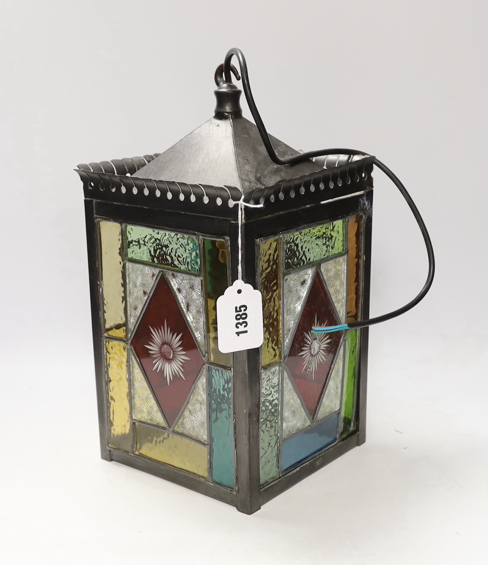 A stained glass panelled hanging lantern